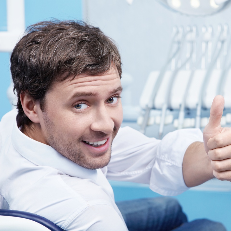 Attractive man in a the dental chair
