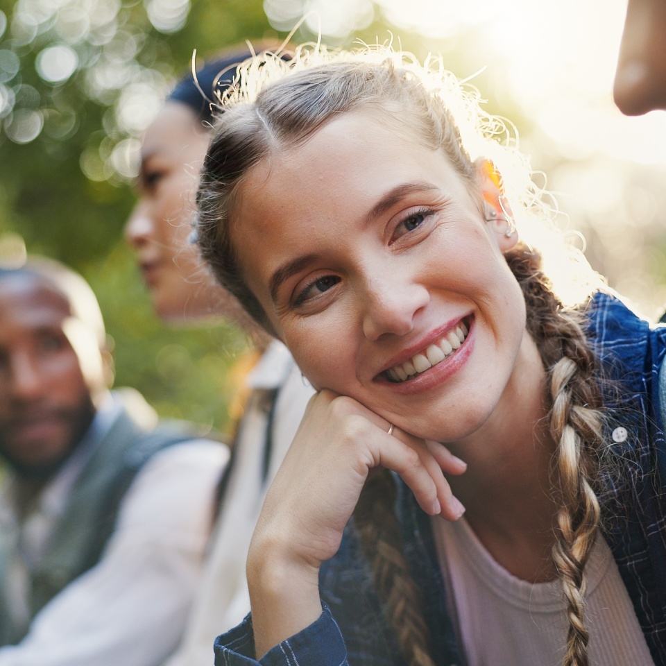 Hiking, nature and people with conversation, travel and relax with weekend break, hobby and adventure. Group, outdoor and friends with discussion, journey and fitness with smile and calm in forest